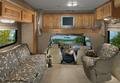 Interior living area front with Pebble Gray interior and Cherry cabinetry